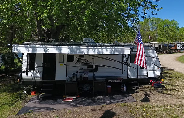 Pull-through RV site with full hookups at Adventure Bound Beaver Trails